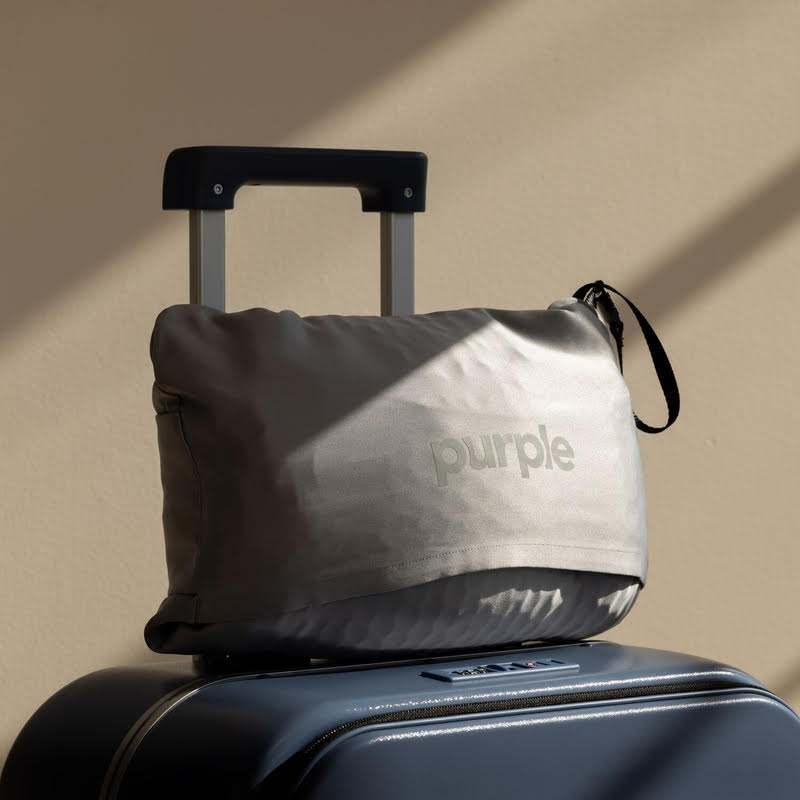 Purple travel pillow staged image